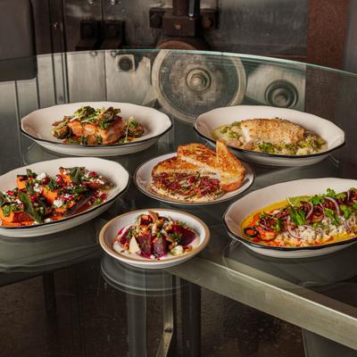 Various dishes served on a table, front view.