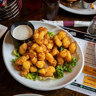 Cheese curds served with a creamy dipping sauce.