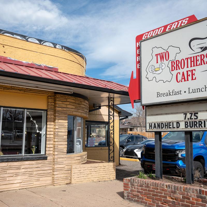 The restaurant's sign in front.