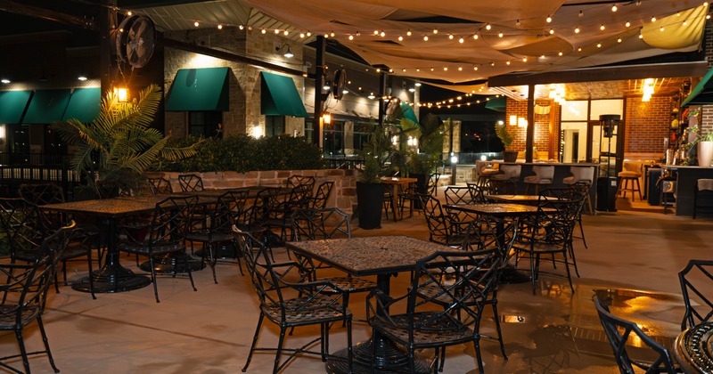 Outdoor, seating area with tables and chairs