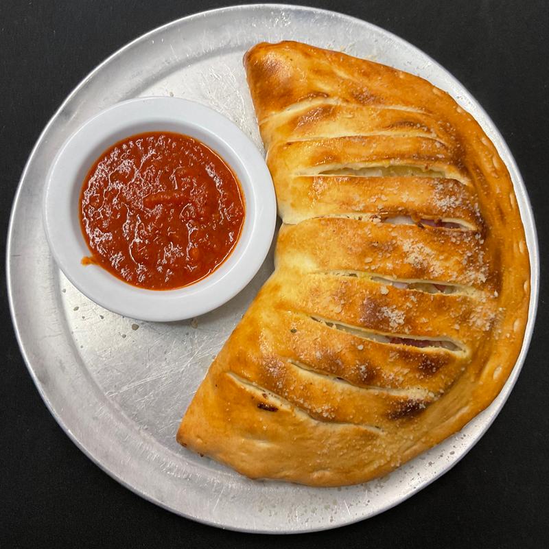 Extra Topping for Pizza or Calzone photo