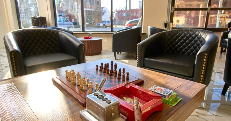 A table with a chessboard in the lounge area.
