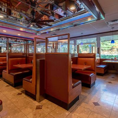Interior, dining area, booth tables.