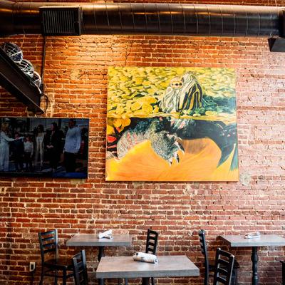 Dining table, wall paintings.