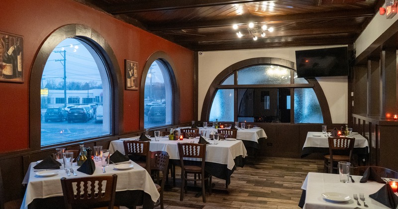 Cozy interior dining area with set tables ready for guests