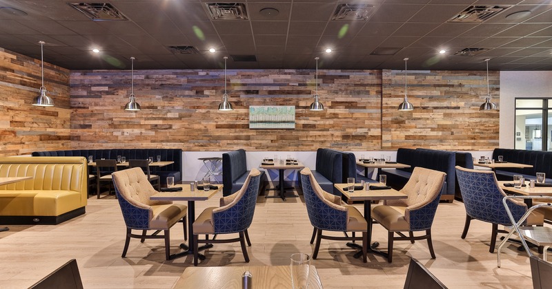 Nicely done interior dining area with set tables ready for guests
