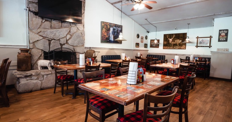 Interior, tables and chairs ready for guests