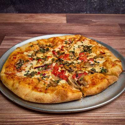 Veggie Pizza, with mozzarella, marinara, onion, mushrooms, red peppers, and basil.