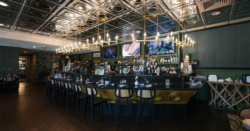 Interior, seating area with a bar