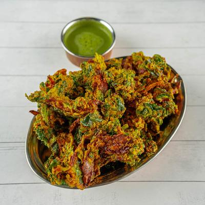 Battered spinach served with chutney.