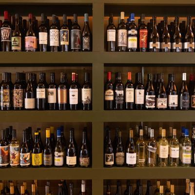 Shelves filled with various wine bottles.
