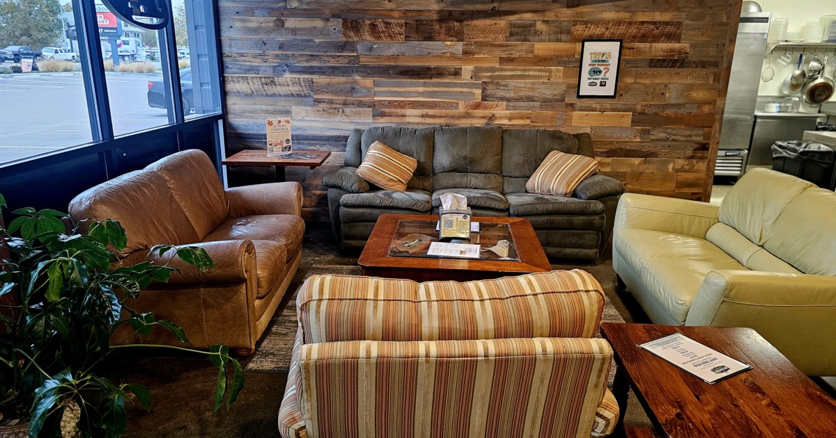 Lounge are with couches, comfy chairs, coffee table and side tables