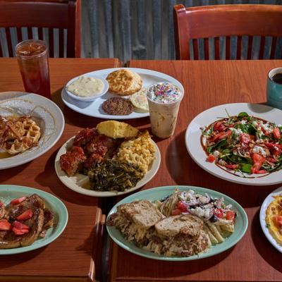 Assorted food and drinks on the table.