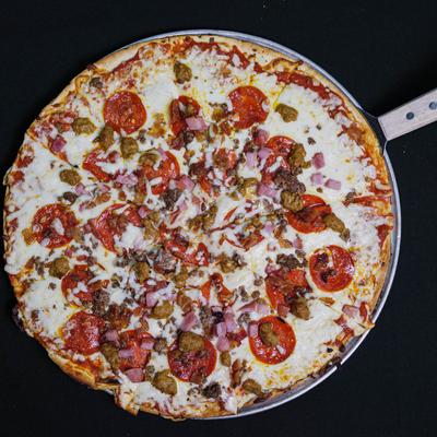 Pizza with pepperoni, Italian sausage, ham, ground beef, bacon, and 4 cheese blend.