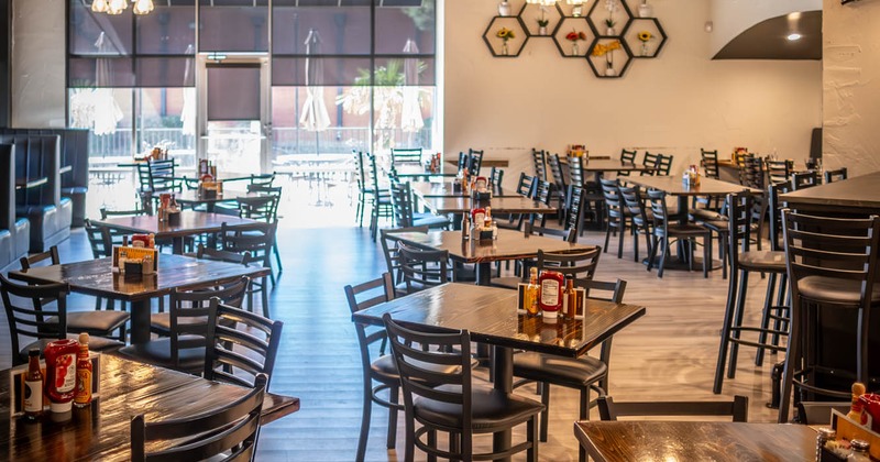 Inside space, tables ready for guests