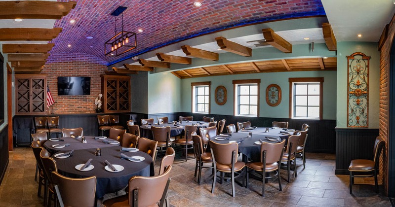 Interior, table and buttoned brown leather sitting booth