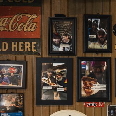 Framed pictured on the wall.