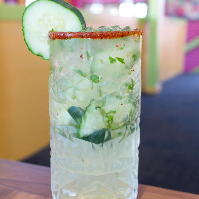 A glass of cucumber margarita.