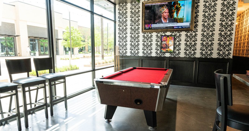 Interior, pool table and tv above