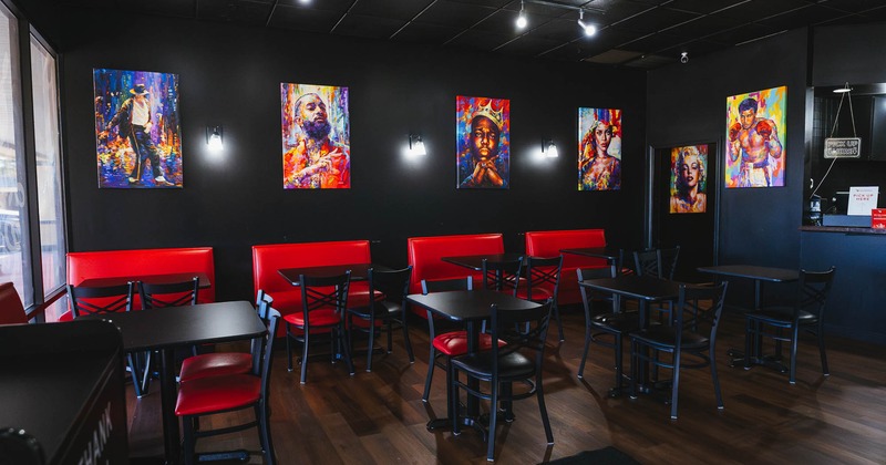 Interior, dining area, tables with banquette benches and chairs, various celebrity posters