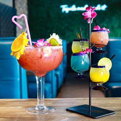 Colossal Margarita Strawberry and a cocktail Flight.