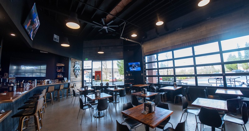 Interior, seating area with tables and chairs