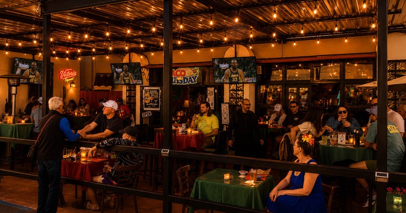 Customers dining and drinking