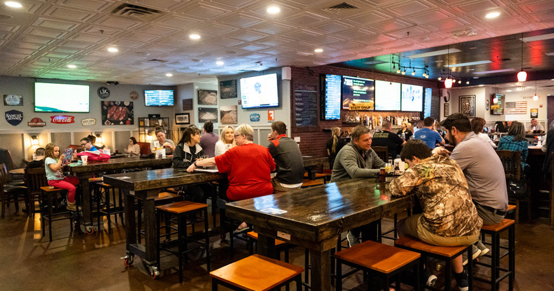 Interior, guests sitting at tables