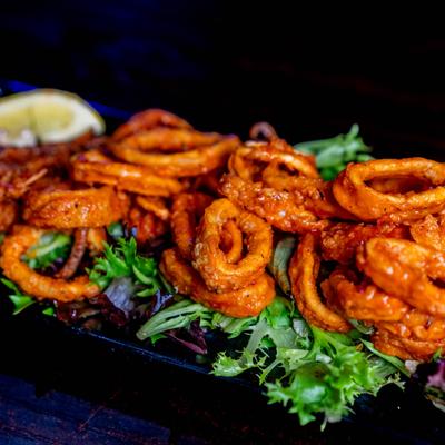 Fried buffalo style calamari.