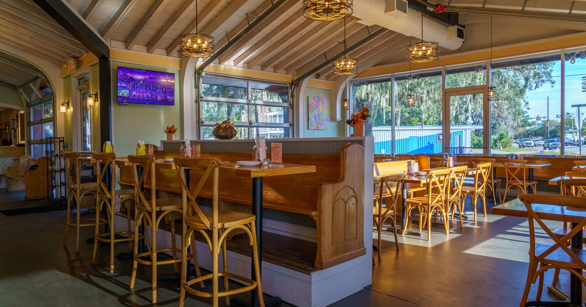 Interior, high tables and chairs in dining area