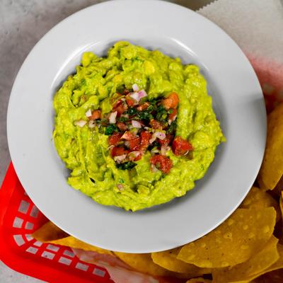 Fresh guacamole dip and chips.
