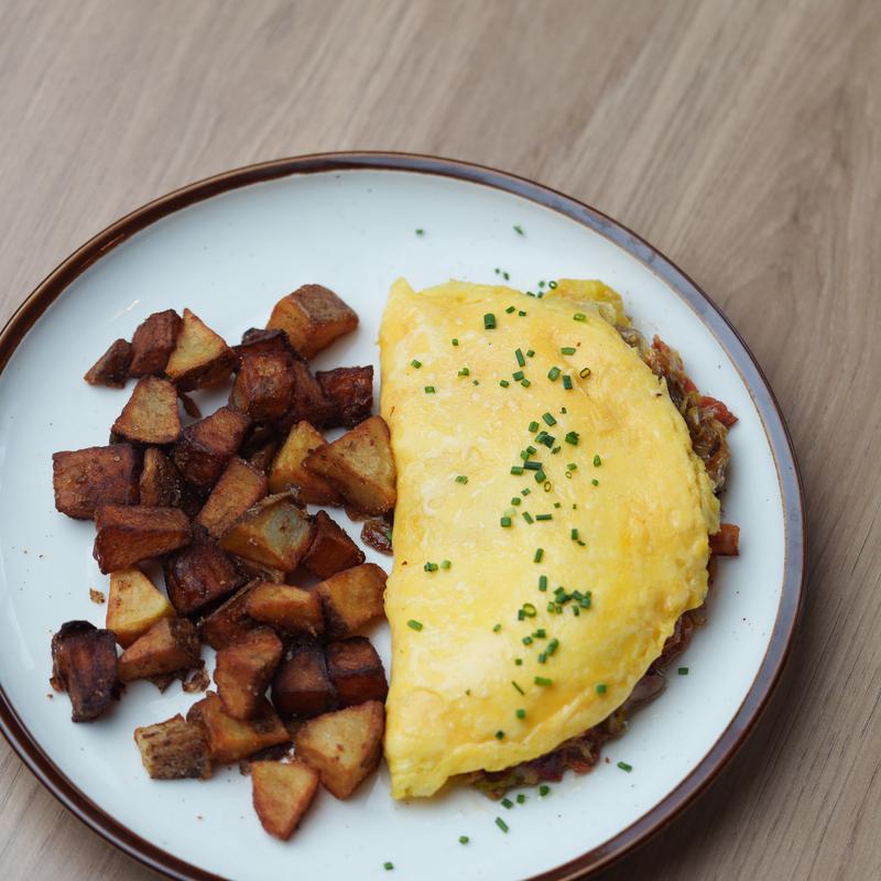 menu item 97 of 116, House-Made Omelet -  Bacon, Cheese, Leeks & Cherry Tomatoes