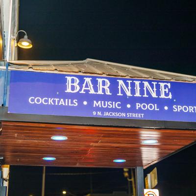 The bar's name in front of the entrance.