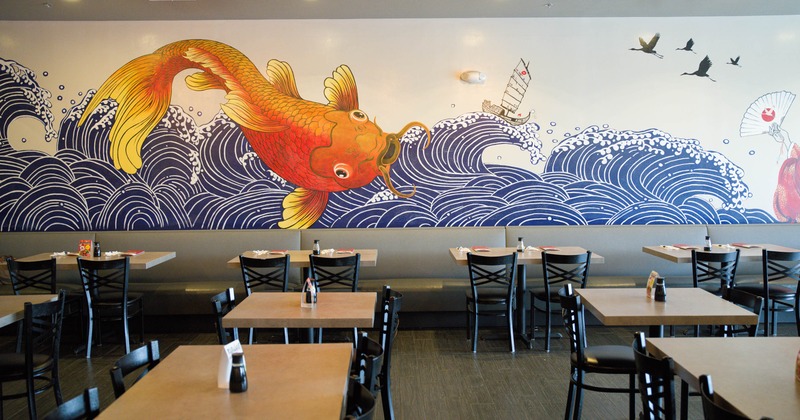 Interior, large mural, on the wall, banquette seating, tables, chairs