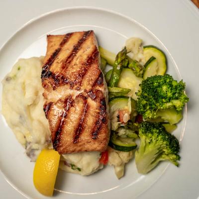 wood grilled salmon, mashed potatoes, vegetables.