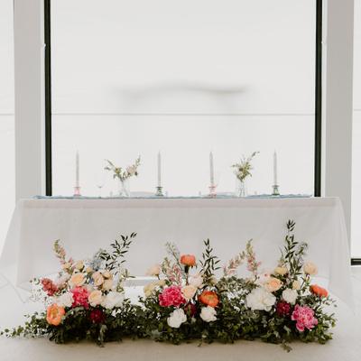 Reception tables decorated for a wedding at Next Chapter Winery.