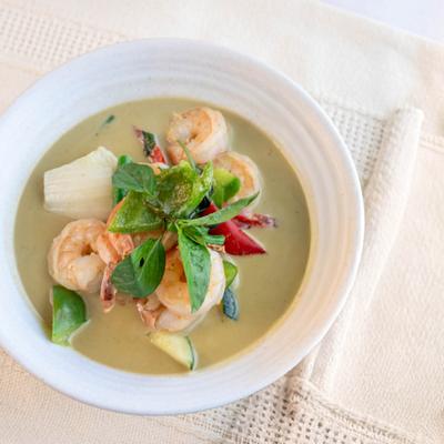 Green curry  with shrimp and fresh herbs.