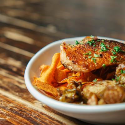 Maple glazed salmon with brussels sprouts and potatoes.
