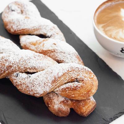 Pastry topped with sugar.