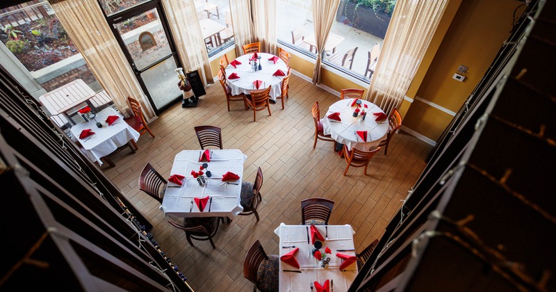Interior, tables and chairs ready for guests