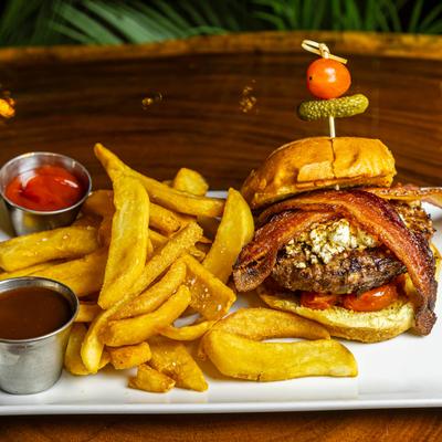 The 239 Beast Burger served with pickles, French fries, and a side of espresso ketchup.