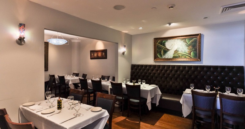 Interior, tables, chairs and high back long bench