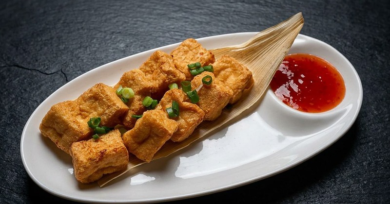 Air fried tofu cubes served with dipping sauce