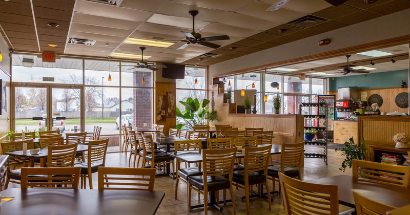 Interior, dining area next to windows