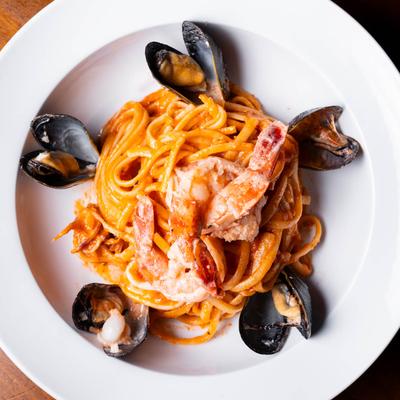 Seafood pasta, in creamy tomato sauce.