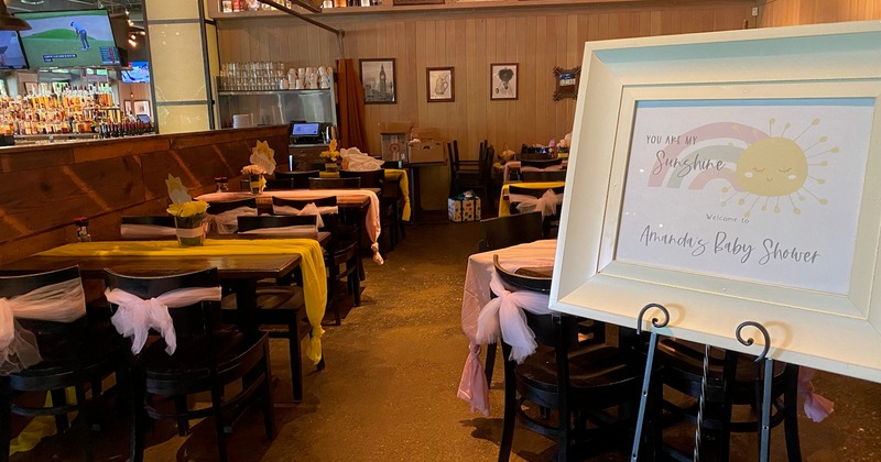 Interior, dining area prepared for a baby shower party