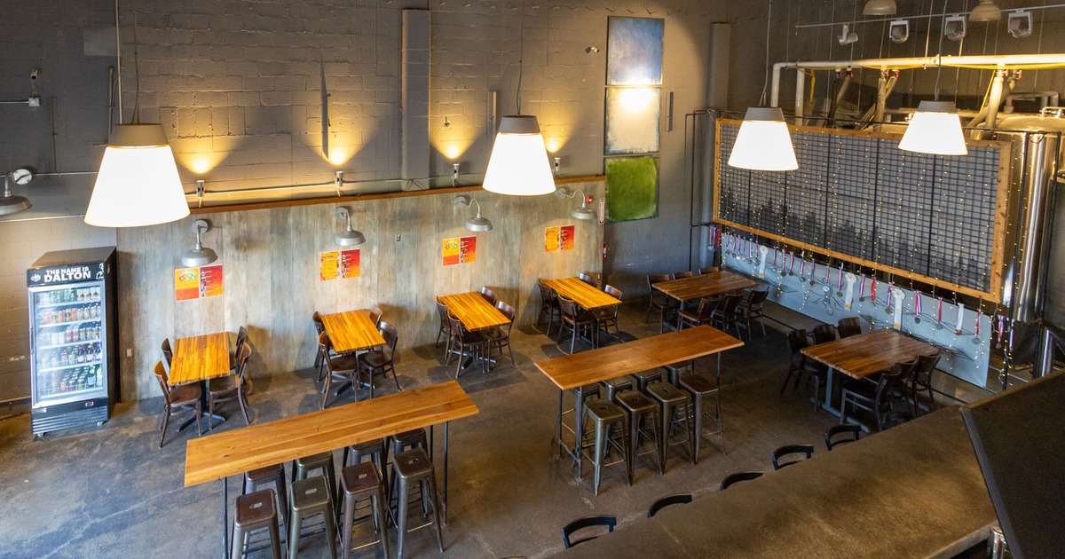 Bar area, tables and chairs, view from gallery