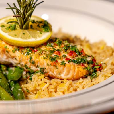 Pan seared salmon with rice and green beans.