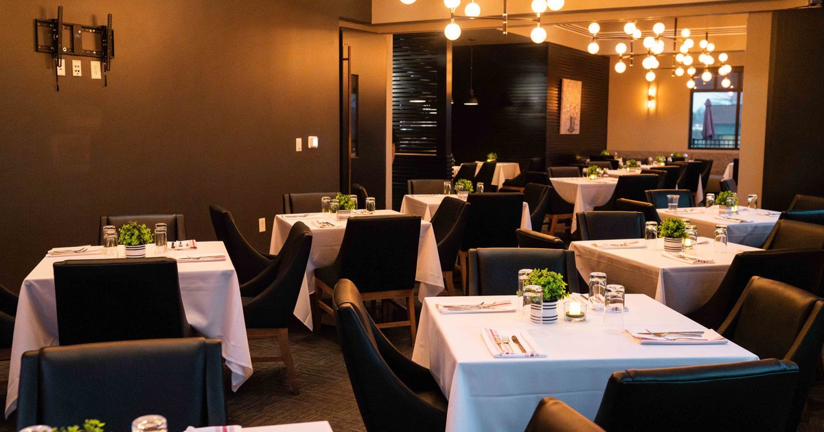 Interior, dining area with set dining tables and seating