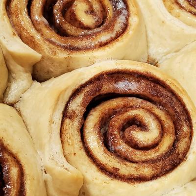 Close-up of freshly baked cinnamon rolls.